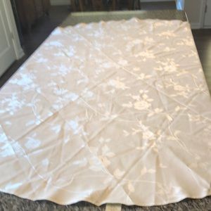 Lenox 70” round ivory table cloth.  Never used.